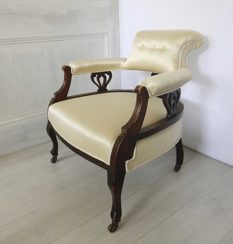 Edwardian salon tub chair upholstered in a satin oyster damask.