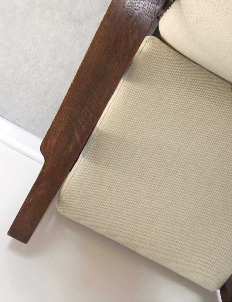 Arts & Crafts oak reclining armchair: detail of basket weave seta fabric.