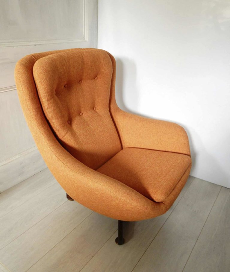 1970s retro G-Plan swivel chair; newly upholstered in orange fabric- top view.
