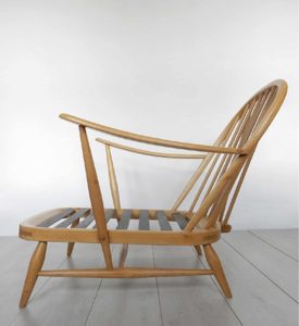 A classic Ercol 203 armchair; restored beech and elm frame.