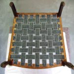 Edwardian chair upholstery - black and white webbing to seat.