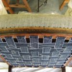 Edwardian chair upholstery - view of webbing to seat.