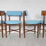 Four vintage G Plan 'Fresco' dining chair newly upholstered in a marine blue fabric by Scion fabrics.