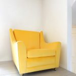 1970s G-Plan armchair reupholstered in bright yellow velvet fabric